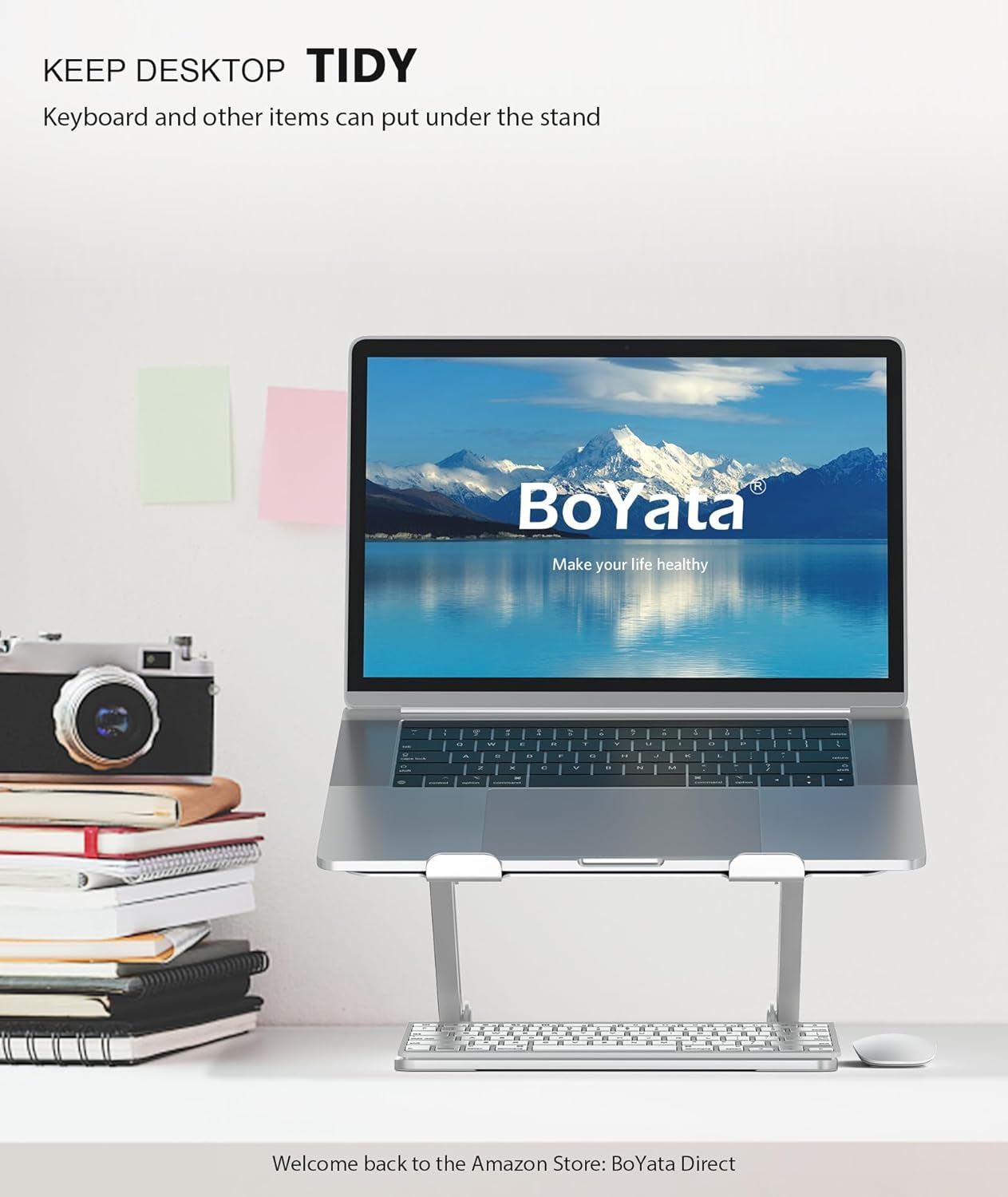 Adjustable metal laptop stand with heat ventilation and non-slip silicone pads for laptops up to 17 inches.