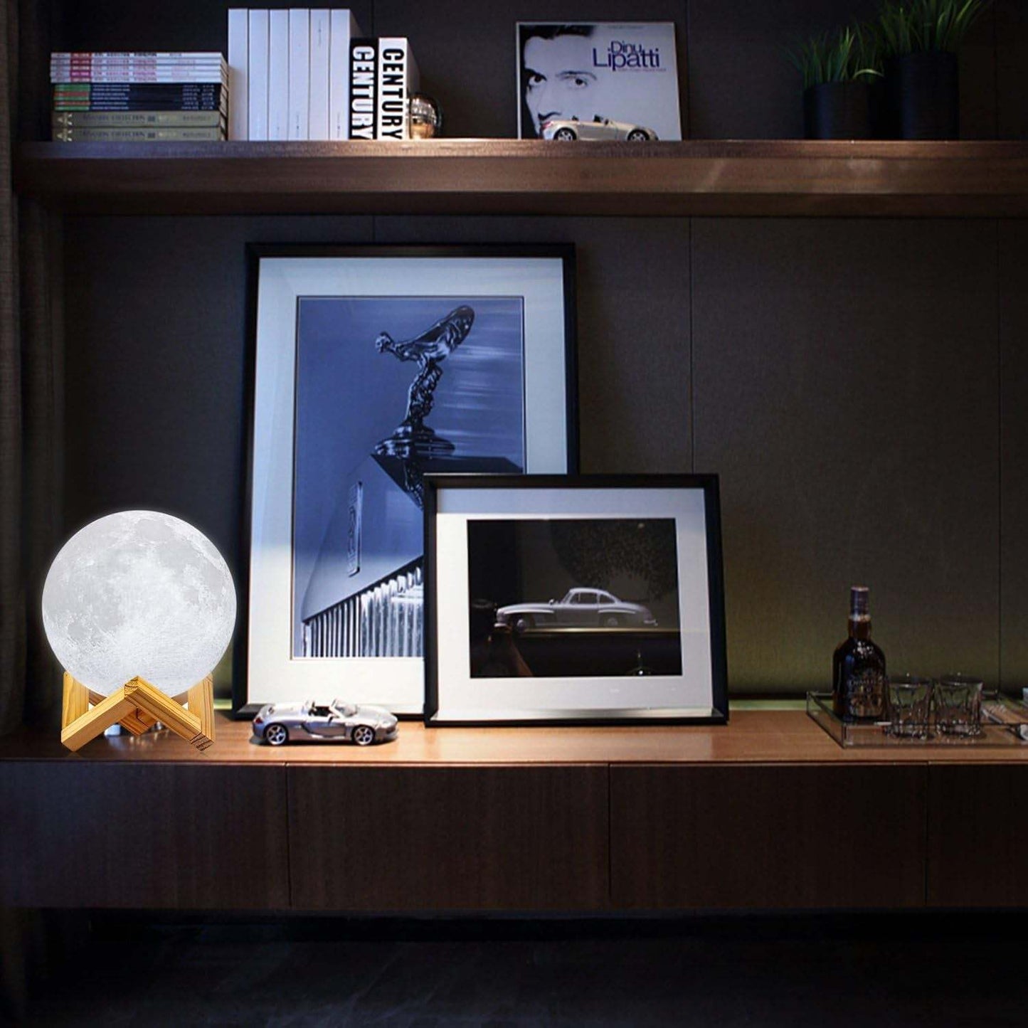 3D printed 4.8 inch Moon Lamp with wooden stand glowing on a shelf, realistic lunar surface night light with remote and touch control.