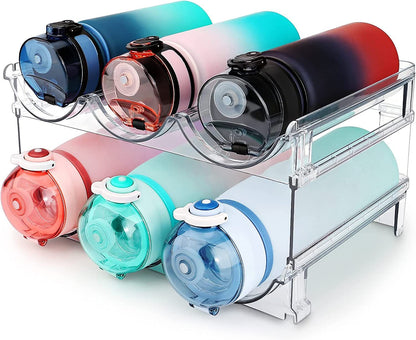 Stackable clear plastic water bottle organizer holding six colorful bottles, space-saving storage rack for cabinets.