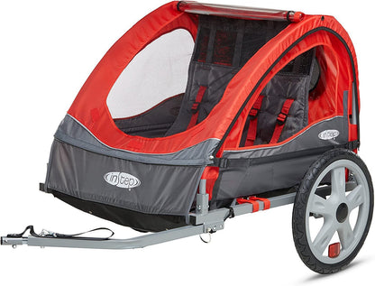 Red and gray Sync and Take 2 bike trailer for kids with folding frame, 5-point harness, bug screen, weather shield, and quick release wheels.