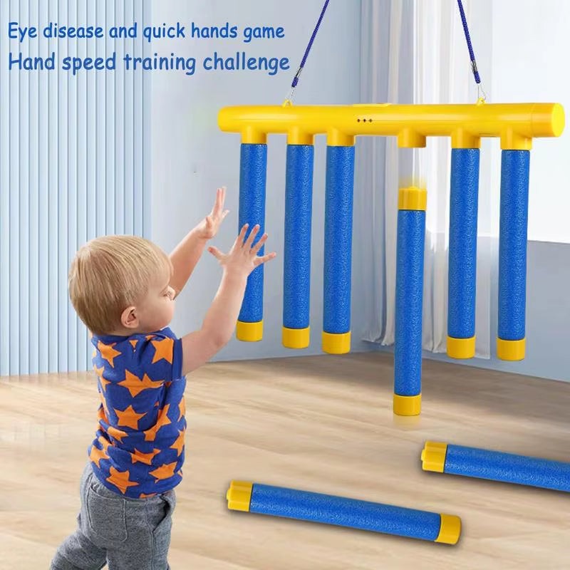 Child playing with Challenge Falling Sticks Game to improve reaction and hand-eye coordination skills