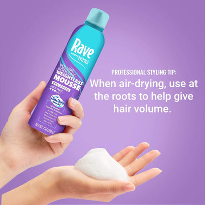 Hand holding Rave Volume Boosting Weightless Mousse bottle and foam with professional hair volume styling tip text on purple background