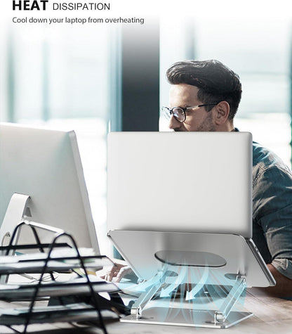 Adjustable metal laptop stand with heat ventilation and anti-slip pads supporting laptop cooling and ergonomic posture.