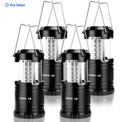 Set of four black LED collapsible camping lanterns with metal handles, battery powered, portable, and water resistant for outdoor and emergency use.