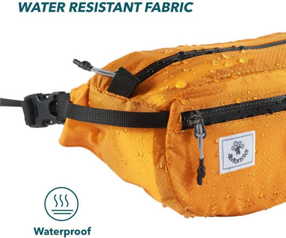 Orange water-resistant hiking waist pack with adjustable strap and zipper compartments showing water droplets on fabric