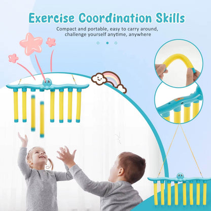Kids playing the Falling Sticks Game hand-eye coordination toy with yellow sticks and blue main rod